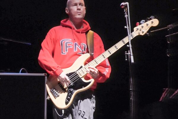 Limp Bizkit Mourns Loss of Bassist Sam Rivers at 48 Sam Rivers, bassist of Limp Bizkit, performing live on stage